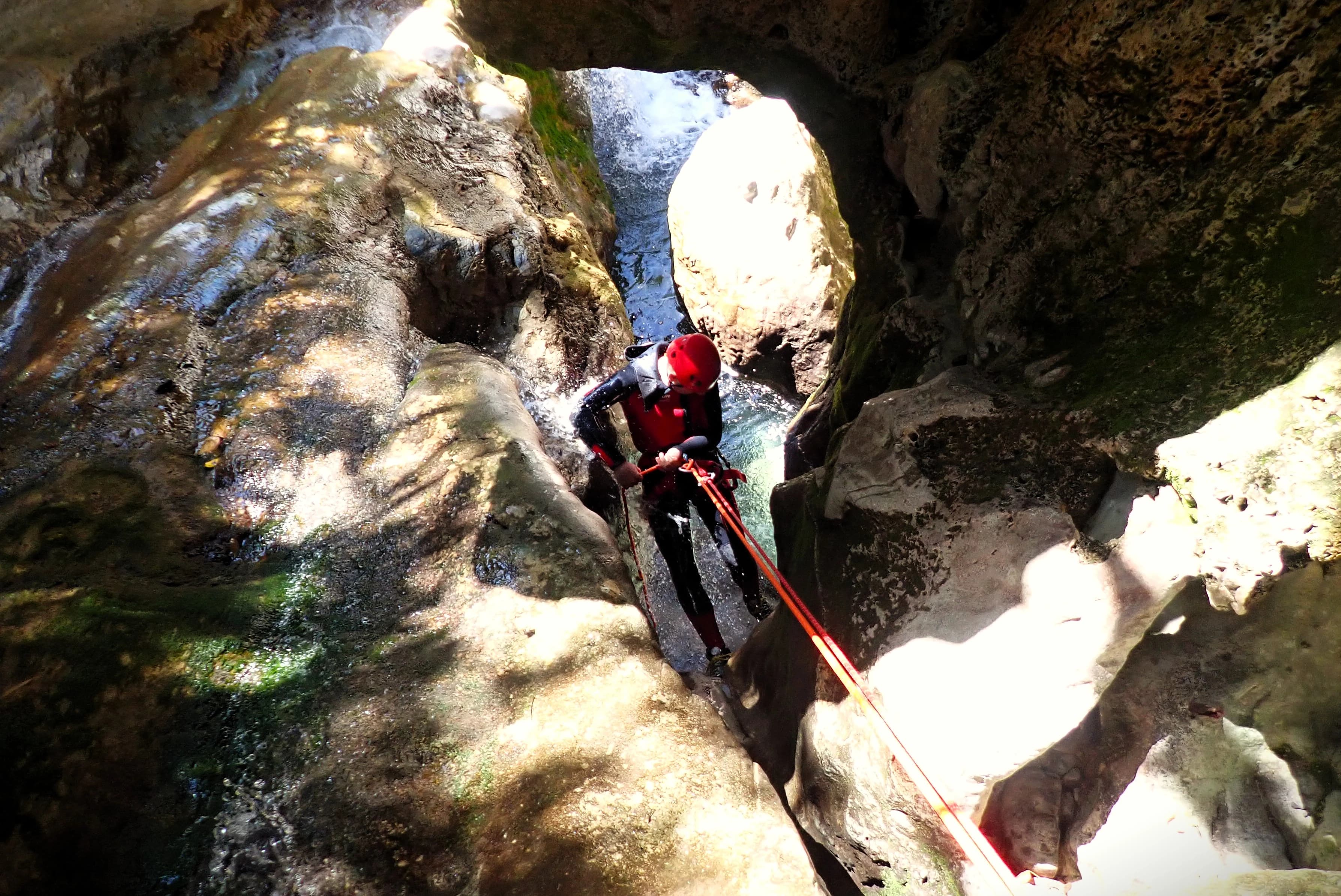Zarzalones canyon - Sliding down a natural water slide in zarzalones canyon